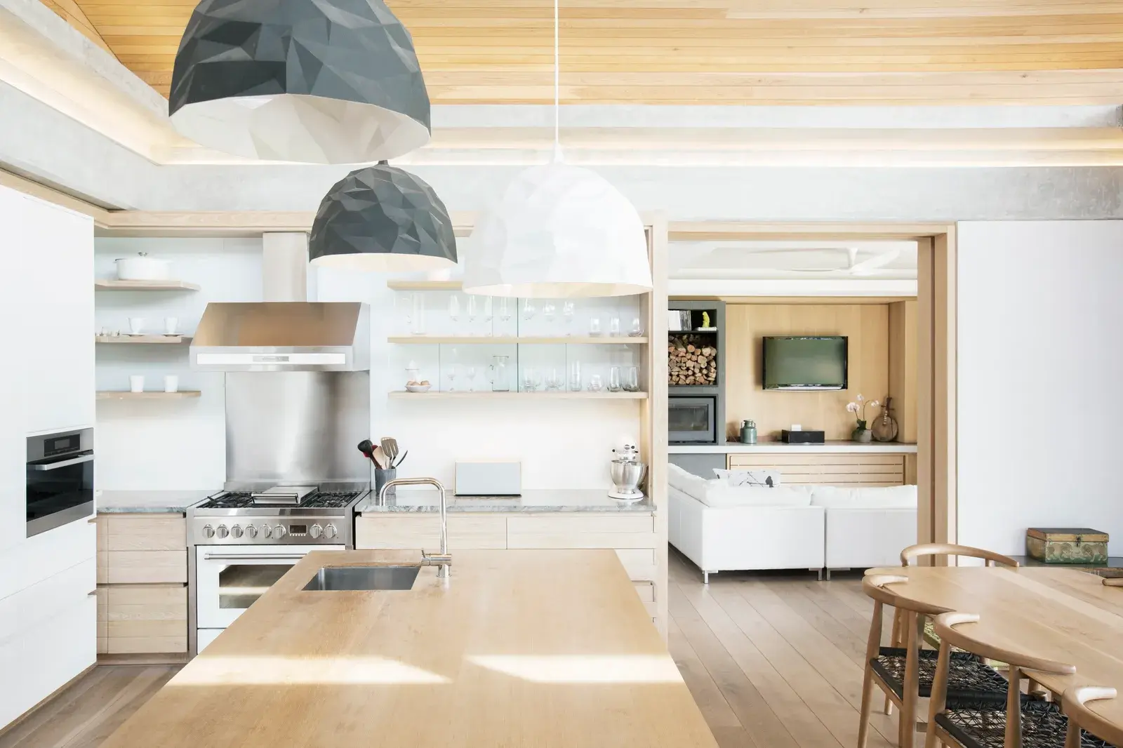 A bright kitchen and welcoming living room